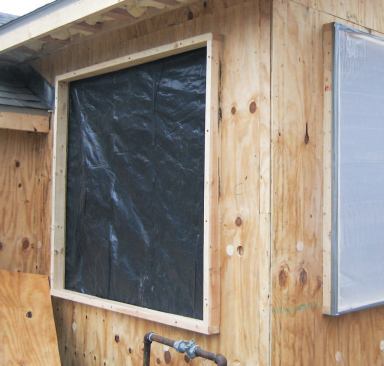 While nailing up the new sheathing, the carpenters took the time to bore holes over each framing cavity — much to the appreciation of the insulation sub who would later fill them with densepack cellulose.