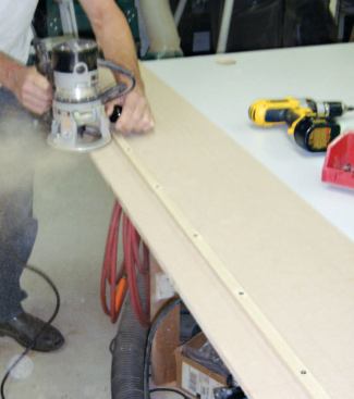 The first step in creating perfectly mating sides was to make an accurate MDF router pattern. A thin strip of straight-grained poplar described the curve for the router to follow in cutting the template.
