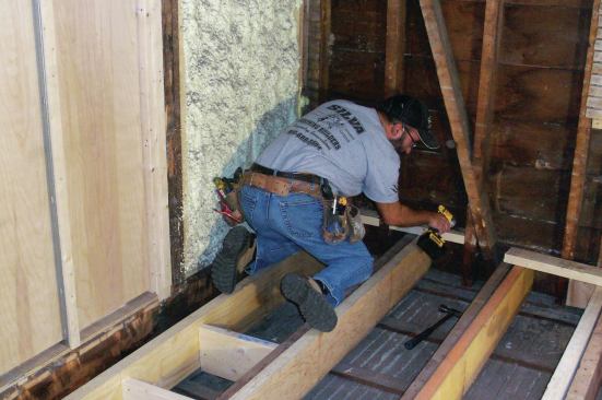 At the ends of the joists, I added horizontal 2x4 blocks between the wall studs to close off the bottoms of the stud bays and to provide nailing for the wallboard.