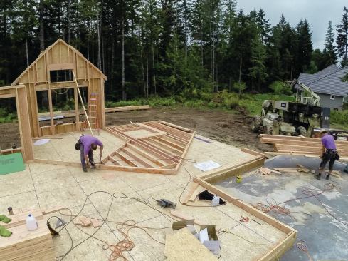 Using two guys—one cutting and one framing—is most efficient on these walls. With a cut list in hand, the sawyer can work at the lumber pile. To simplify things, we have just one lumber length for studs. When I do the materials take-off, I always calculate the height of the wall at the peak and order all the studs at that height.