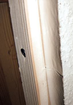 As the force is applied, well beyond the yield point, the strapping begins to pull through as the screw rotates slightly.
