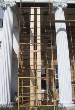 Double-post assemblies were joined by top and bottom plates stacked two high in order to support the roof while work was being performed on the columns.