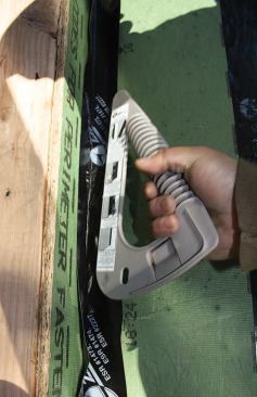 A corner tool included in the gun kit is useful for applying pressure to inside corners and valleys.