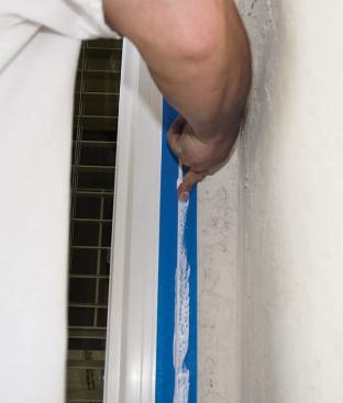 Sealant should be compressed as the window is installed, and tooled after the window is fastened in place, to remove small voids and air bubbles.