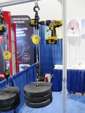 Pulley-Man. This is one of the coolest things I saw at NHS, a drill-powered (you supply the drill) hoist with models capable of lifting 660 or 1,240 pounds. Made in Korea, it is not yet available in the U.S.; the manufacturer is trying to find vendors willing to pick it up. I hope they do because I’d like to have one of these things. The smaller model will sell for about $100. 
Click here to see a video of the hoist in action.