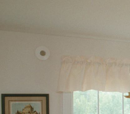 Placement isn't as important as providing an accurate number of outlets per room and avoiding blockage.