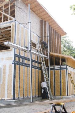 Securing the vertical I-joists.