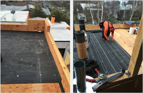 Asphalt roofing underlayment being applied to the roof deck.