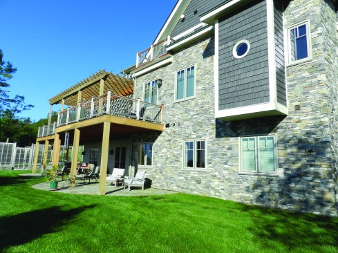 By the end of the project, everyone involved was a convert to the idea that real veneer stone could be successfully installed on top of relatively thick foam. The clients are extremely happy with the way the stone looks after three and a half years. There are no indications of any cracking, none of the stone has come off, and the exterior surface is self-cleaning when it is rained on, so it still looks quite good.