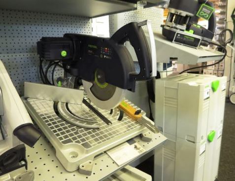 The Festool 
Symetric SYM 70E is a non-beveling chop-style saw with pivoting fences that allow for the automatic bisection of angles. It’s difficult to describe how the thing works—best to 
watch the video. This saw is available in Europe but not the U.S.