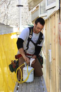 Pollard point seals wall penetrations using a canister of foam sealant.