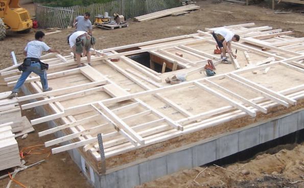 Precut studs, joists, and rafters saved labor and substantially reduced waste.