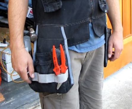 The loops on the front of the pockets are for storing pliers and snips. You have to match the width of the handles to the width of the loop. If the handles are too narrow the tool will fall through. The narrow loop towards the back is perfect for needle nose pliers. The nice thing about the loops is you can get at tools quickly and the tips won’t wear holes through a pocket.