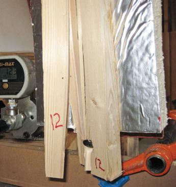 In another test, the wood has split and the fastener rotated at maximum load.