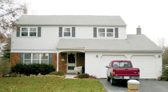 Careless site preparation at the time of construction left this 30-year-old home with a sinking driveway, a cracked and leaking sewer line, and failed slabs in the garage and the family room behind it.