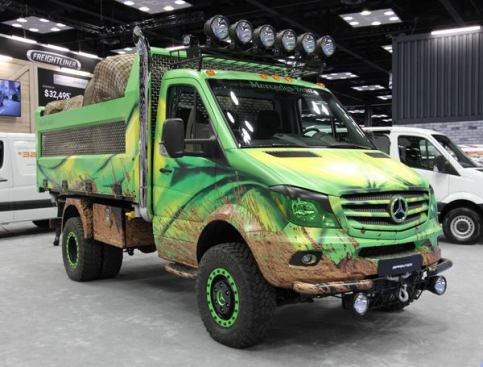 Look closely and you’ll see that the mud is painted on this showy Mercedes truck. The boulders in the dump bed are fake. Unlike the beds on most North American models, this one dumps to the side—which I am guessing is because space is tight on European jobsites.