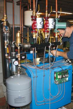 As part of the system upgrade, the author installed new circulator pumps and expansion tanks.