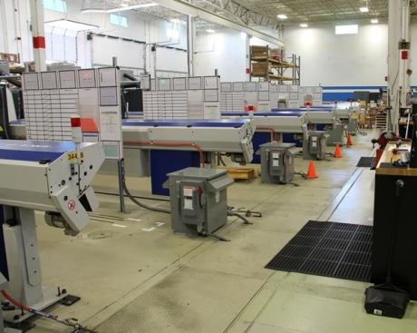 This is a bank of CNC machines. I’d tell which particular tools they are used to make but I don’t remember. And it wouldn’t matter – one of the beauties of CNC machining is that with minor changes to setup machines can be switched between products at will.