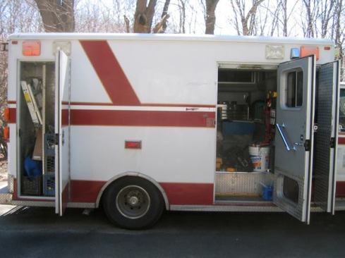 Same view as in the previous slide--only here the doors are open. The rear compartment has a vertical divider and you can see through the door to the module that there's a step up to the floor of the interior.