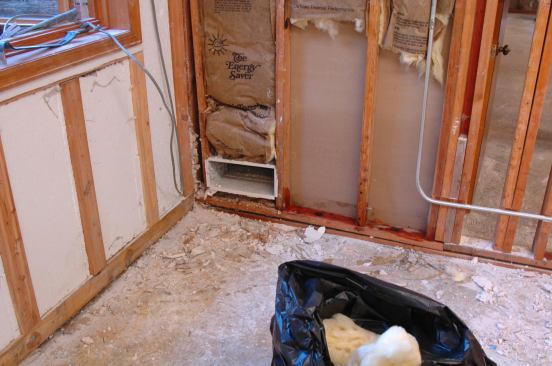 HVAC ducts need to be drained and cleaned well. Where the window trim is left in place, note that a strip of drywall two inches wide is left to provide enough surface to tape and patch the joint.
