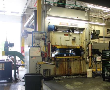 This progressive die metal stamping press is punching out steel pieces for use in various tools—including wire strippers. 
Click here to see it in action.