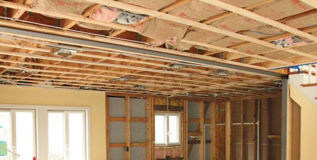 So, despite 1x3 furring crossing the 2x8 ceiling joists, the beam remained 1/4 inch proud of the surface.