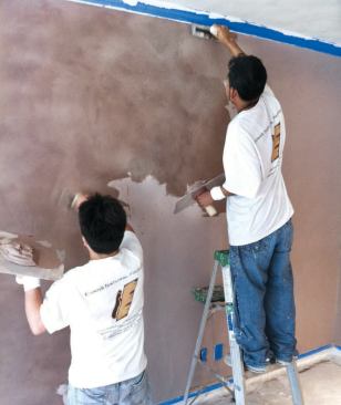 The same coat was applied and to the walls two days later, again to credit-card thickness.