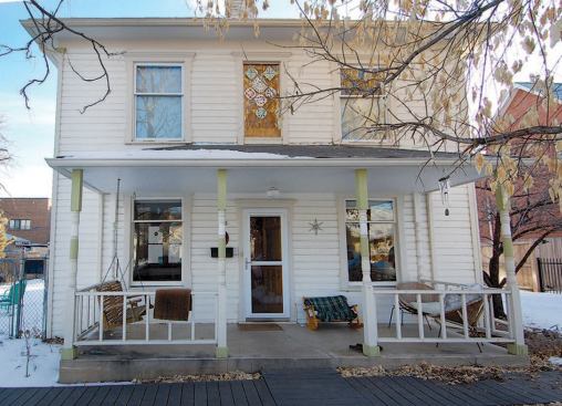 A Victorian-era house's shallow spreadfooting foundation had settled over the years, causing the wood floors of the four-square home to sag, buckle, and splinter.