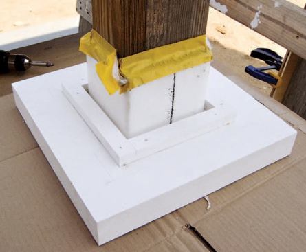 Installation began with the caps and bases of the structural post surrounds; small cleats attached just inside the column sides provide alignment and backing.