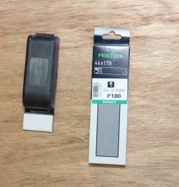 I retired my traditional sanding block in favor of this sanding block from Festool. It’s the only sander they make that does not have dust collection, but it’s still a keeper. I like the quick change Velcro paper as well as the lipped design that allows it to fit into the small fillets and molding profiles we need to sand. You can use the Pocket Stick like a shoulder plane to sand into square inside corners. The proprietary replacement paper is pricey, but is high quality and lasts a long time.