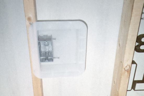 The Lessco box is a 6 1/2x7 1/2x2 7/8-inch airtight plastic box that’s installed at the same time as a regular electrical box.