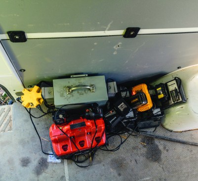 Typically, only one power cord is rolled out to the author’s Sprinter van for all the chargers.