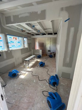 With the house brought back to a “healthy state,” the rest of the job proceeded like a normal kitchen remodel, beginning with new drywall. The drywall crew uses fans to dry their first coat, so they can apply a second coat the same day.