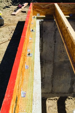 A23 corner brackets secured the mudsill to the rim joist.