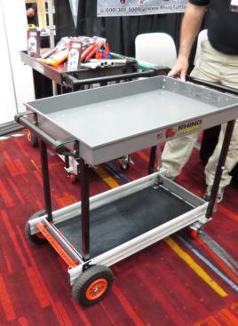 Once open, it’s a very solid cart that can be used to roll tools and supplies around the jobsite or facility. The red cross-piece between the wheels is a foot-operated latch that allows you to release the legs when it’s time to fold the cart. There is a second such latch on the other end. According to the manufacturer, this sub 50-pound cart can hold up to 400 pounds. It’s 22” wide x 44” long x 32 1/2” high when open. The manufacture is selling the tool directly (for about $500) but was at the show to connect with vendors that could distribute it for them. I noticed a card on the table from Costco (which like Amazon and other big retailers was at the show to find new products) so maybe we’ll see the cart there at some point in the future. The Rhino Tuff Collapsible Cart is a very cool product and if it went into mass production the price would probably fall to the point where they’d sell a lot of them.