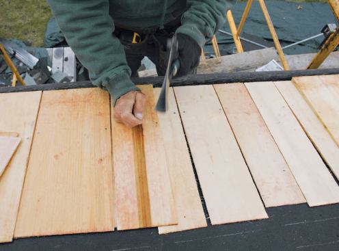 A second starter course is laid with minimum 2-inch offsets between keyways.