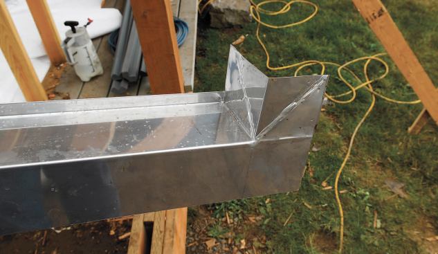 Both one-piece metal door pans and multipiece plastic door pans should be fully bedded in a high-quality polyurethane sealant, not silicone caulk.