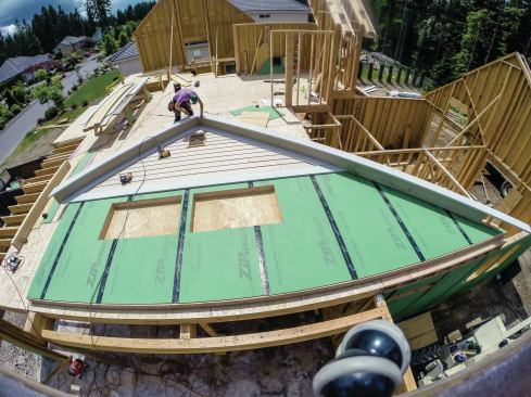 We recently sided a large gable with SmartSide in about 30 minutes, including installing the belly band, z-metal, siding, and "shadow" fascia (trim that hides the cut ends of the siding). This easily would have taken us 2 to 6 labor hours working from scaffolding, depending on the setup.