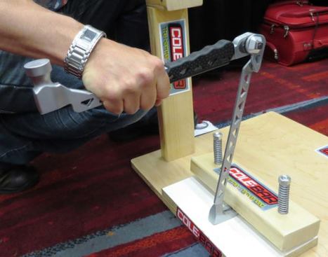 The Cole-Bar can be opened and locked to different angles; here it is being used as an angled prybar.