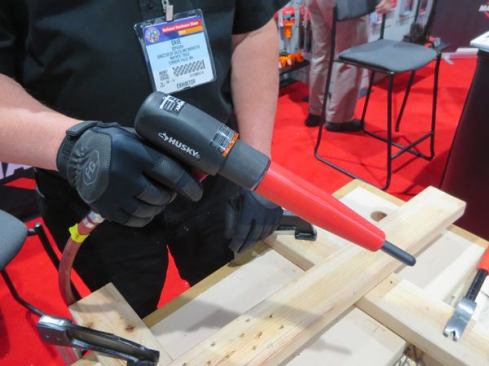 Mahew Nail Remover. This $49 attachment drives nails out of boards. Shown here on a Husky pneumatic chisel, it can be attached to almost any brand. The nose fits over the fastener and drives it out with multiple blows. It doesn’t drive them all the way out—just flush to the back of the board. Unlike the better-known Nail Kicker ($399) this does not drive fasteners all the way out; it drives them flush to the back of the board. It takes a pry bar or hammer to get them the rest of the way out. 
Click here to see it in action.