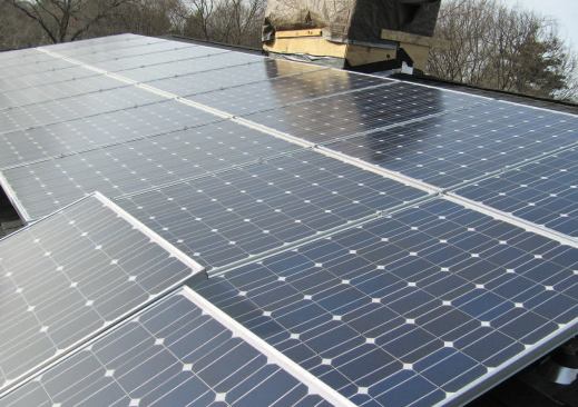 A 7-kW PV array on the shed-dormer roof is projected to supply more than 100 percent of the home's electrical consumption.