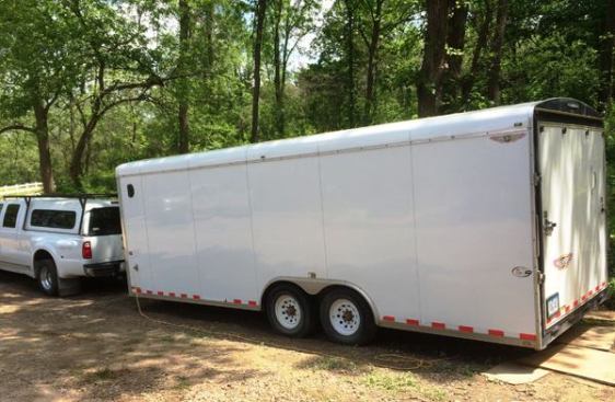 There are two ways to access the interior, through a door on the right front side of the trailer and via the ramp door on back. Hokel removed the ramp cable from the right side of the trailer. This made it easier to enter and exit the trailer (can walk off the side of the ramp) without making it that much harder to open and close the ramp.