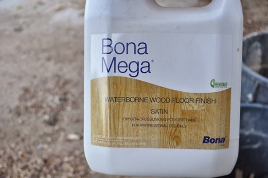 Bona Mega is about 30% less costly than 
Bona Traffic and is easier to work with because it's a one part poly (no mixing).