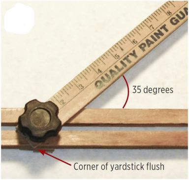 The hole at the bottom of the yardstick should be drilled so that its bottom corner is flush with the bottom of the plywood strip when the gauge is open to approximately 35 degrees (the pitch of a 7-over-10 stair).