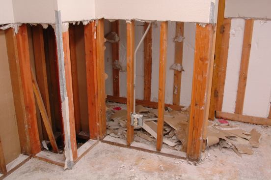 Cutting out corner bead is tricky. An angle grinder with a thin cutoff wheel would be my tool of choice; second best would be an oscillating multi-tool fitted with a metal cutting blade. Third choice would be a reciprocating saw with a very fine tooth metal cutting blade.