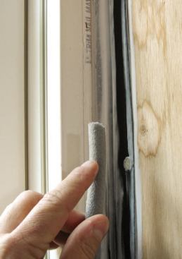 Foam backer rod, sealed with caulk, was used in lieu of expanding foam around window and door jambs.