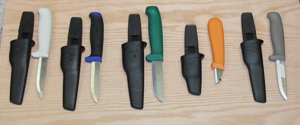 Here are all the Hultafors knives I have. From left to right they are: painter’s knife, general purpose knife, heavy-duty knife, electrician’s knife, and plumber’s knife. These are just some of the knives the company makes.