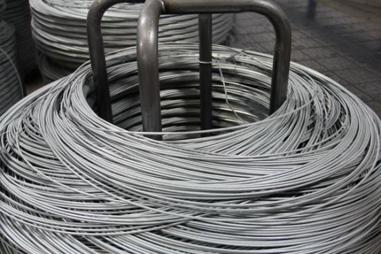 Most nails and staples are made from steel wire. This galvanized wire will be made into nails.