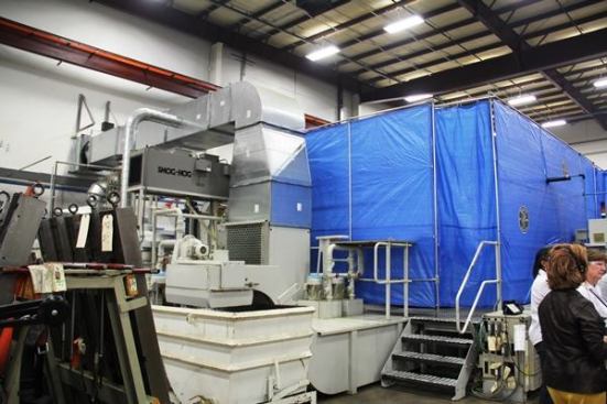 Behind the blue tarp is the super-secret automated machining center that replaced the Green Machine. The tour guide indicated that if I were to sneak a peek he’d have to kill me. He didn’t actually say that, but I could tell that’s what he was thinking—so I decided not to chance it.