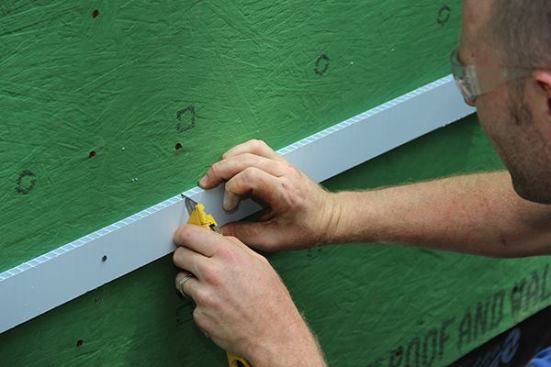 Easy to work with, the corrugated plastic strapping cuts easily with a utility knife.